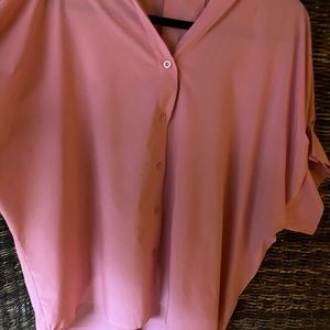 Amaryllis blouse w/a short pleated sleeve.